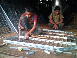 জীবিকার তাগিদে ওয়ার্কশপে কাজ করছে শিশুরা। বাগেরহাটার যাত্রাপুর বাজার এলাকার একটি ওয়ার্কশপ থেকে ছবিটি তোলর। -ইনজামামুল হক।